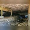 A damp, neglected crawl space before waterproofing work was done.