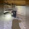 After encapsulating the crawl space, our team installed a dehumidifier to help control excess humidity and maintain more consistent moisture levels. The new moisture barrier covers the floor and walls, creating a much cleaner and more controlled crawl space environment.
