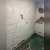 This foundation wall was very cracked and unfortunately starting to bow. This corner of the basement was also having issues with moisture.