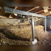 For this different area of the home, the wooden framing was actually in pretty good shape, but the joists needed some lateral support in the middle. We installed a row of our jacks in this room as well. Swipe to the next photo to see more jacks in the same room as this one.