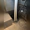 The sump pump system is shown before the surrounding crawl space was encapsulated. The pump provides a way to remove collected water as part of the home's crawl space moisture-management system.