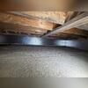 Our team installed SilverGlo insulation panels around the perimeter of the crawl space, creating a cleaner and more finished-looking wall treatment while also helping improve insulation beneath the home.