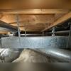 These floor joists didn't have enough support to prevent sagging over time.