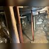The floor system above was originally supported by adjustable steel lally columns located in the basement. Over time, these columns experienced significant corrosion and deterioration, compromising their load-bearing capacity and resulting in floor settlement and deflection. To restore proper...