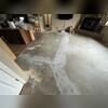 A wide view of the interior concrete floor after crack-stitch repairs were completed. Multiple sections of the cracked slab were repaired to reinforce the damaged concrete.