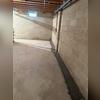 WaterGuard is designed to collect water that enters around the foundation and direct it toward a sump pump system for removal.