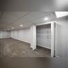 The unfinished block walls were finished with the EverLast Wall System, creating a clean and durable finished wall surface.