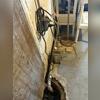 This home's original sump pump had failed at keeping water out of the basement, leading our crew to install our newest sump pump system.
