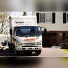 A photo of the truck outside the customer's home.