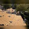 With the old shingles removed, the crew could closely examine the existing plywood decking underneath. This important step allows the team to evaluate the roof's structural foundation before covering it with the new roofing system.