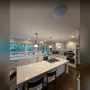 An access point positioned in the kitchen helps extend reliable wireless coverage into one of the home's most frequently used spaces.