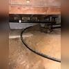 This crawl space had the dirt floor exposed, where moisture could easily seep up through the ground and into the crawl space itself.