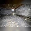 Before the DryZone team got to work, Tamond's crawl space had an exposed dirt floor with an old, ineffective vapor barrier. These conditions can allow ground moisture to enter the crawl space, contributing to high humidity and an unhealthy environment beneath the home.