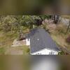 From above, the finished Glacier roof showcases the home's complete transformation. A ridge vent was incorporated along the roof peak to support attic ventilation, while the plumbing vent received an updated pipe boot to create a secure, weather-resistant seal around the penetration. Together with...