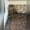 Before repairs began, moisture and staining were visible along the exterior wall and paver patio. Water had been collecting near the foundation, creating concerns about moisture making its way into the Orange Park, FL home.