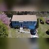 Here's a look at Mark's roof before work began. Dating back to approximately 1985, the aging three-tab shingles had provided decades of service but were ready for replacement after Mark experienced multiple leaks inside the home.