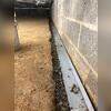 The foundation of a dry basement starts with the WaterGuard system, perfectly placed in the trench.
