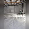 The original sump pump in this crawlspace failed, which led to the homeowner calling Woods. If your sump pump fails your space can be seriously in danger, with no protection from the flow of potential leaks or water in your basement.