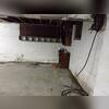It was evident that water had made its way through the very bottom of these concrete block walls and the floor from the water stains left behind.