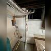 Radon extraction piping installed through the basement floor in the utility room.