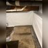 During installation the drainage system is surrounded by small rocks, this allows the seepage to reach the system and easily flow through to the sump pump. After this step, concrete is placed over the pipes in the floor, creating a clean and unobtrusive look.
