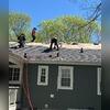 The crew installed IKO Dynasty architectural shingles in Granite Black, giving the home a refreshed appearance and a durable new roof covering. These shingles feature a Class 3 impact-resistance rating for added protection against certain impacts.