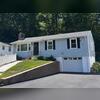 The finished roof features IKO Dynasty architectural shingles in Granite Black, giving the home a refreshed appearance. With new decking, protective underlayment, and updated flashing, Henry and Connie's roof replacement is complete.