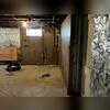 Water intrusion was occurring through cold joints in the basement foundation, allowing moisture to migrate into the wall assembly. Over time, this trapped moisture accumulated between the fieldstone foundation walls and the finished wood-framed walls, creating conditions conducive to material...