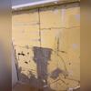 The cracks along this wall allowed for water to seep through into the basement, this led the homeowner to call Woods.