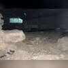 The crawl space has an exposed dirt and sand floor with an older fieldstone foundation, highlighting the conditions considered when planning radon extraction and crawl space encapsulation.
