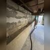 This foundation wall had seen better days. It was bowing and had a very large horizontal crack.