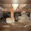Shown here is the crawl space looking a bit rough! The DryZone team properly insulated the entire crawl space. This will also help from draft problem and it is energy efficient.