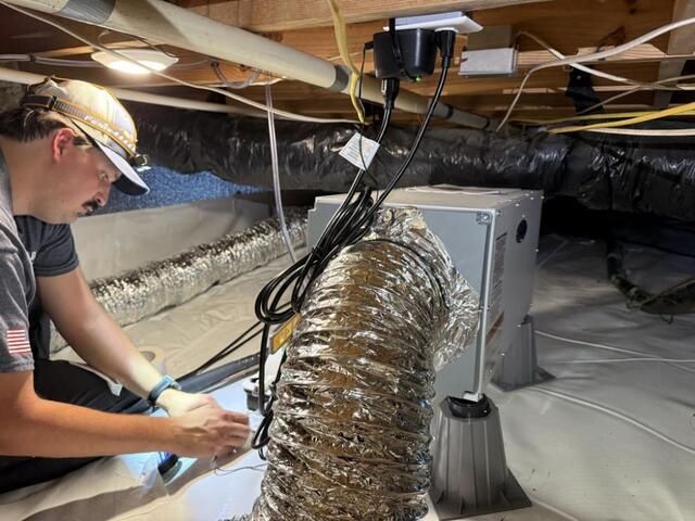 Solomon Completes a final inspection on crawl space encapsulation